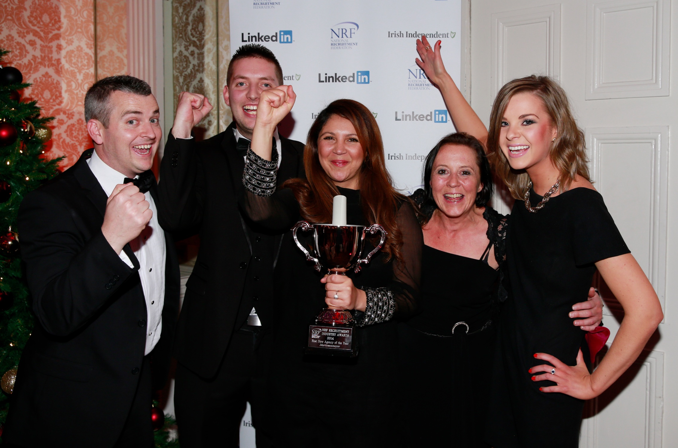 Martinsen Mayer accept the award for best new agency 2014 from Liana Canavan(far right) from the Irish Independent