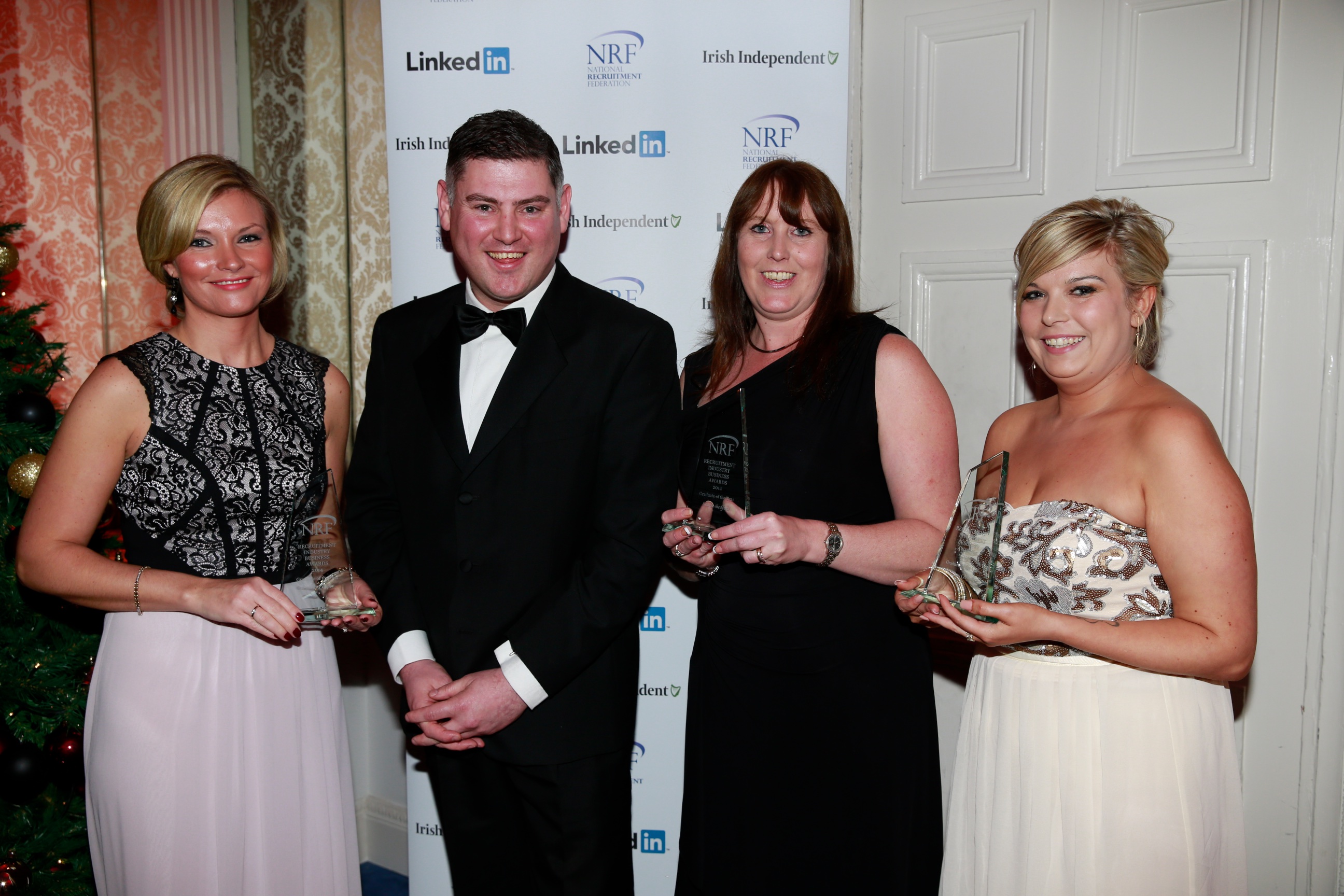 Top graduates for year 2014 Eimear Cooper Excel Recruitment Louise Bedford Noel Recruitment and Amy Corr Manpower with NRF VP Frank Farrelly