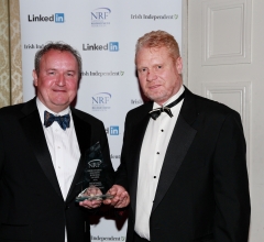 David O'Reilly of O'Reilly Recruitment winner of Best in Practice light industrial accepting his award from Sponsor Les Cooke of Project House